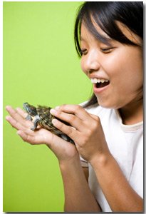 young girl with her healthy turtle